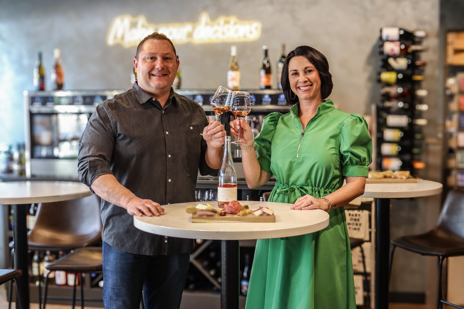 Bob and Colleen Coppola toasting rosé at Rosé Boutique & Wine Bar